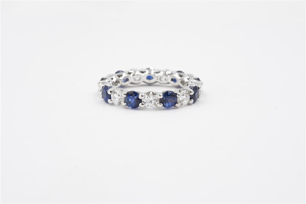 A Link Platinum Diamond and Sapphire Wedding Band