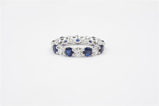 A Link Platinum Diamond and Sapphire Wedding Band