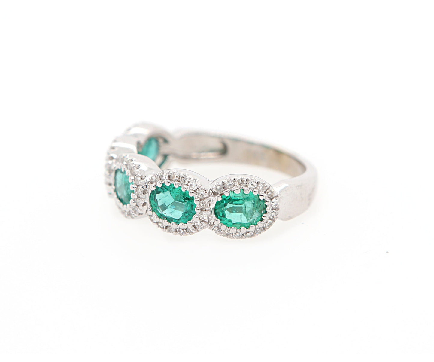 1.50ctw Oval Emerald and 0.25ctw Diamond Frame Ring in 14K