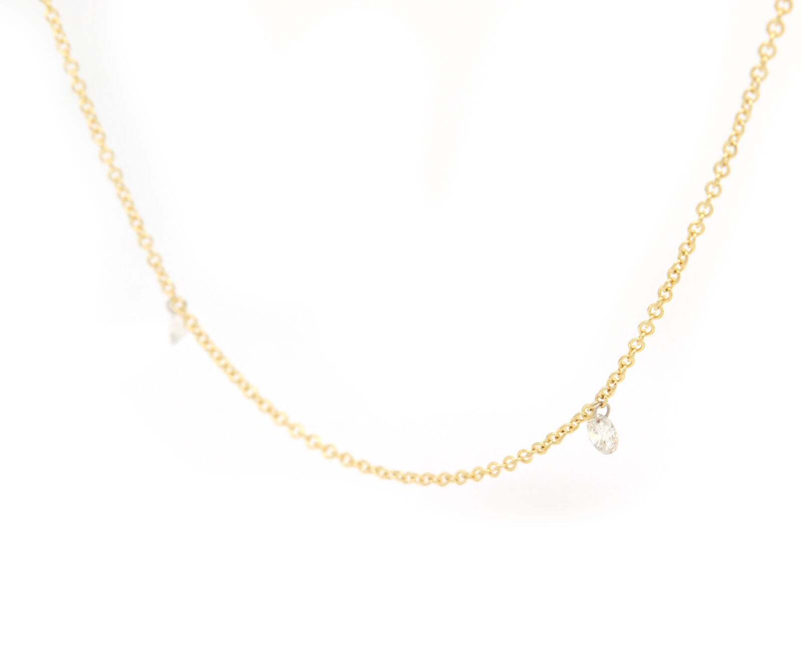 0.67ctw Round Diamond Drilled Floating Station Necklace in 14K