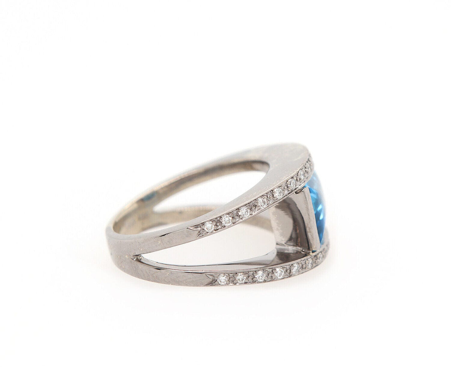 0.25ctw Diamond and Blue Topaz Bezel Set Ring in 14K