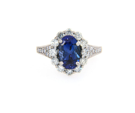 2.71ct Oval Tanzanite and 1.12ctw Diamond Frame Ring in 14K