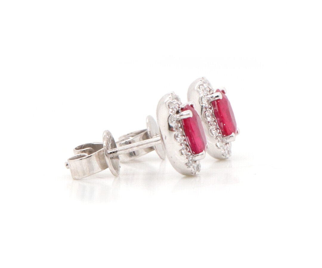 1.20ctw Oval Ruby and 0.50ctw Diamond Frame Stud Earrings in 14K