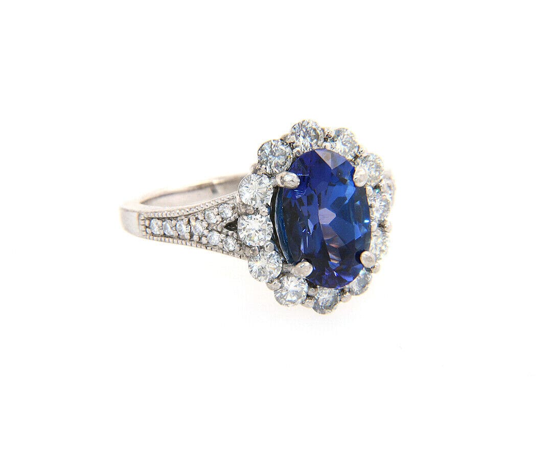 2.71ct Oval Tanzanite and 1.12ctw Diamond Frame Ring in 14K