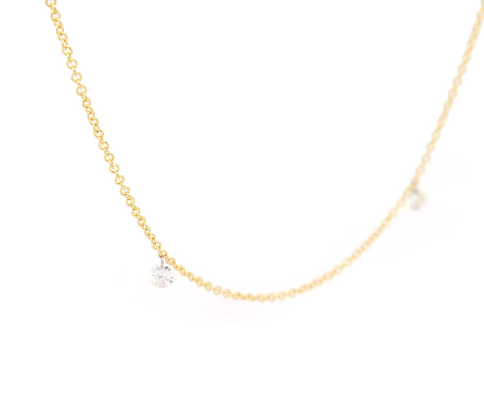 0.67ctw Round Diamond Drilled Floating Station Necklace in 14K