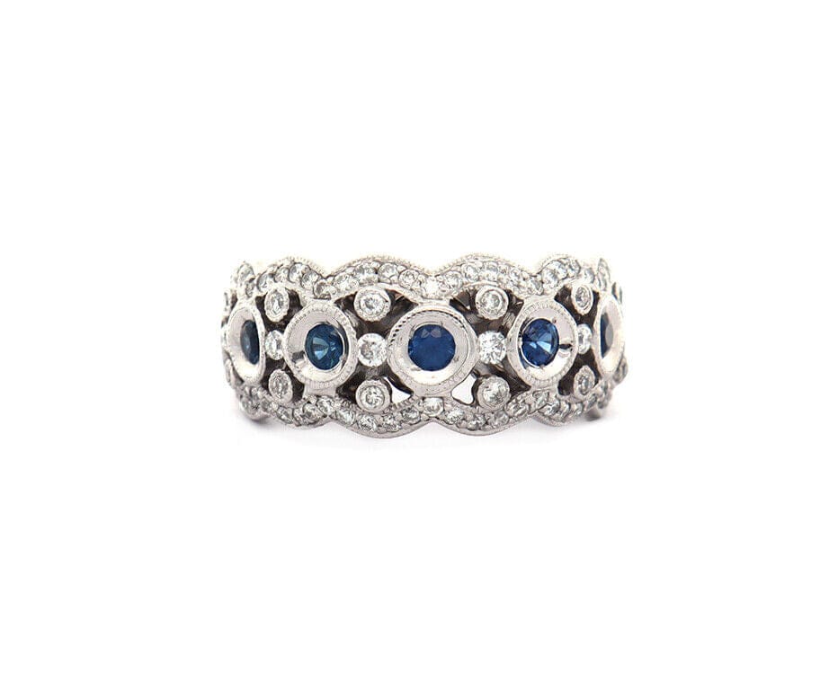 0.32ctw Bezel Set Sapphire and 0.50ctw Diamond Wave Band Ring in 18K