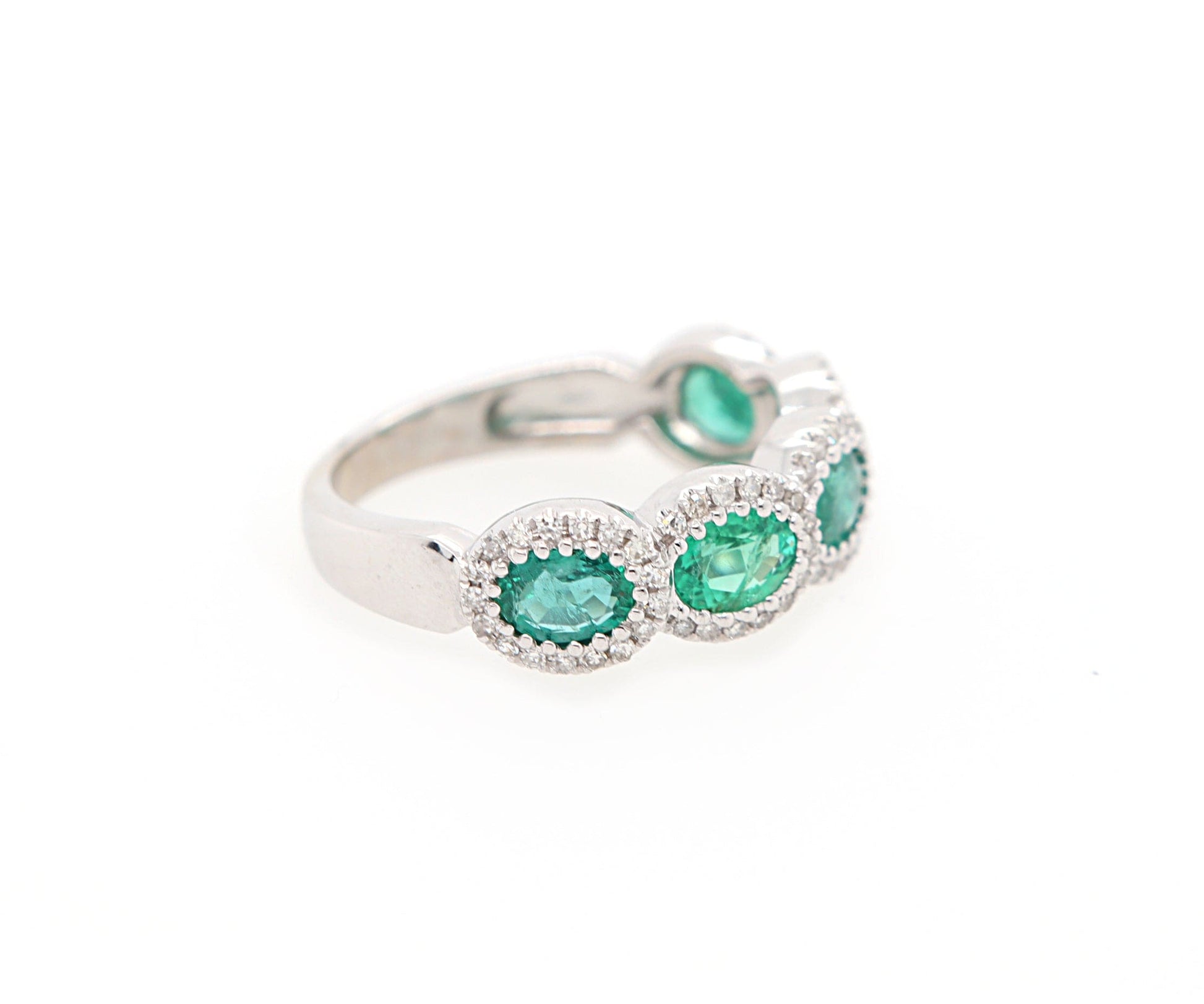 1.50ctw Oval Emerald and 0.25ctw Diamond Frame Ring in 14K