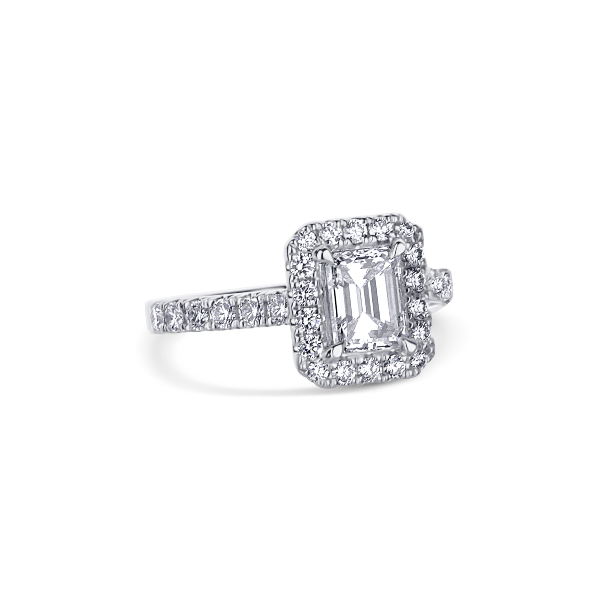 18K White Gold Ring With A 1.11 Carat Emerald Cut Diamond Center Stone And Round Diamonds