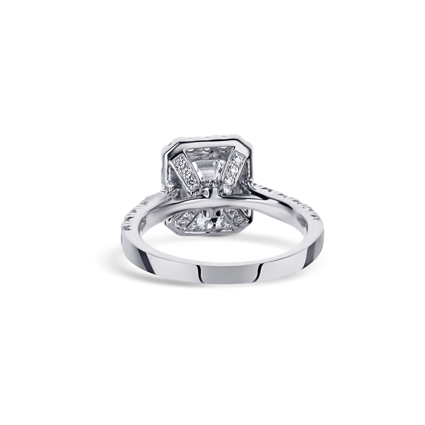 18K White Gold Ring With A 1.11 Carat Emerald Cut Diamond Center Stone And Round Diamonds