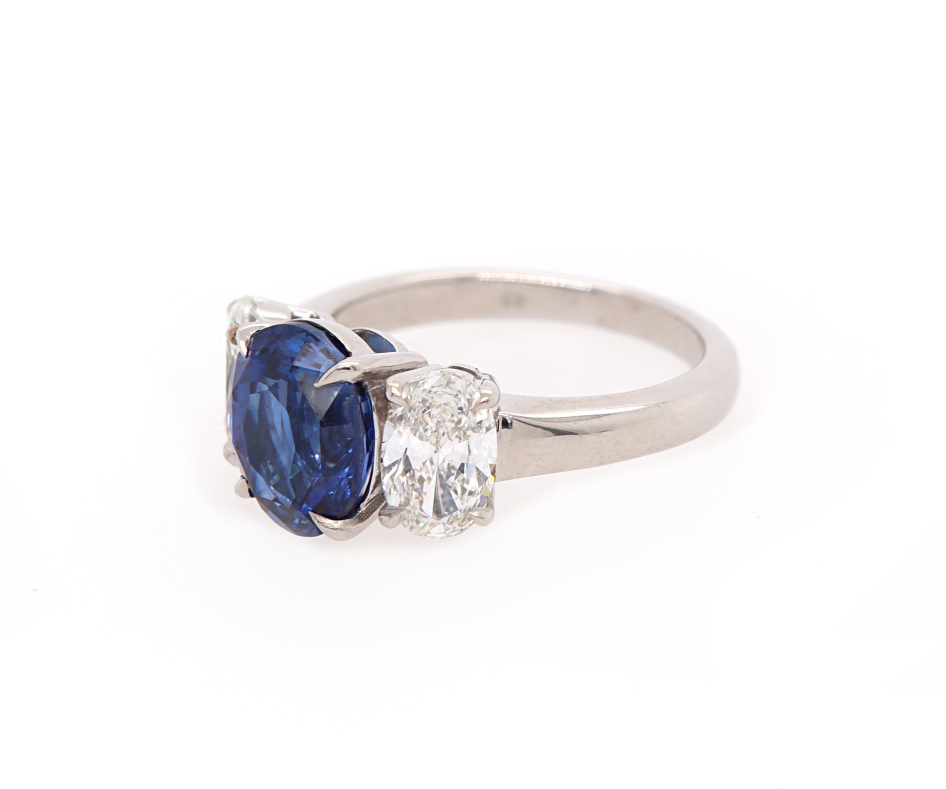 3.59ct Oval Sapphire and 1.45ctw Diamonds Three Stone Ring in 18K