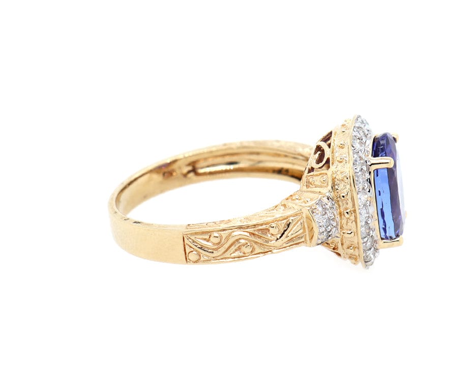 2.50ct Oval Tanzanite and 0.20ctw Diamond Frame Ring in 14K