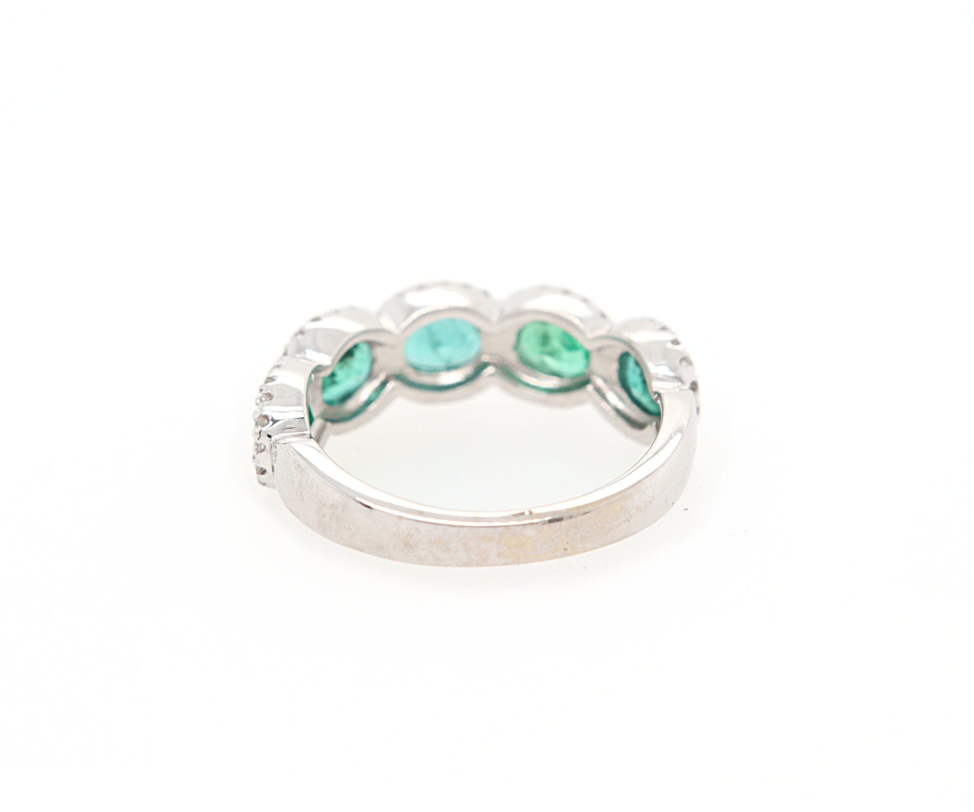 1.50ctw Oval Emerald and 0.25ctw Diamond Frame Ring in 14K