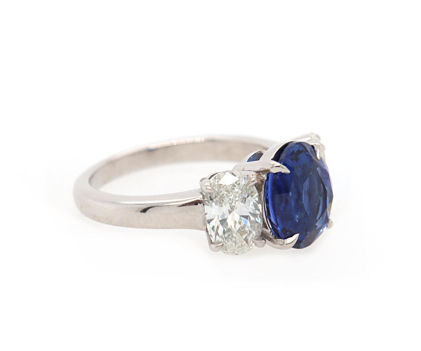 3.59ct Oval Sapphire and 1.45ctw Diamonds Three Stone Ring in 18K