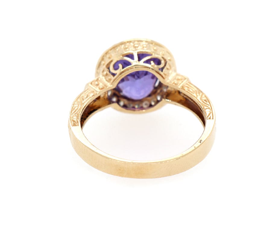 2.50ct Oval Tanzanite and 0.20ctw Diamond Frame Ring in 14K